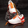 Białe sportowe buty z pomarańczowymi wstawkami Rothina - Obuwie