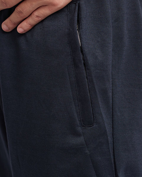 Granatowe męskie proste spodnie dresowe z kieszeniami - Odzież