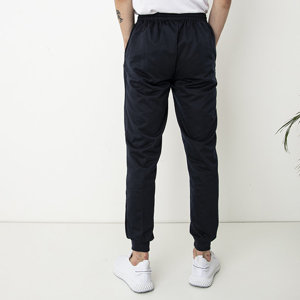 Granatowe męskie spodnie dresowe z kieszeniami - Odzież