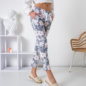 Jasnoszare damskie spodnie w kwiaty - Odzież