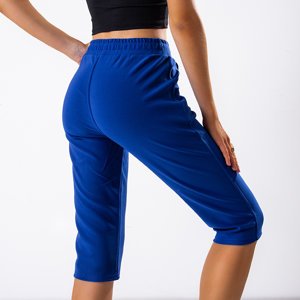 Kobaltowe damskie spodnie o długości 3/4 - Odzież