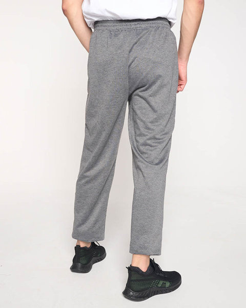 Szare męskie spodnie dresowe z napisami - Odzież