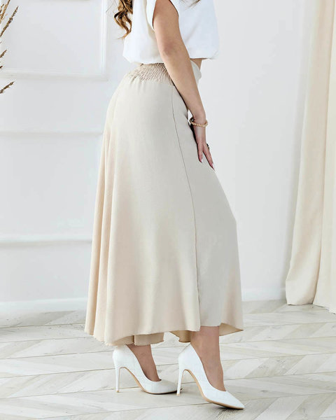 Бежеві жіночі широкі штани палаццо - Одяг