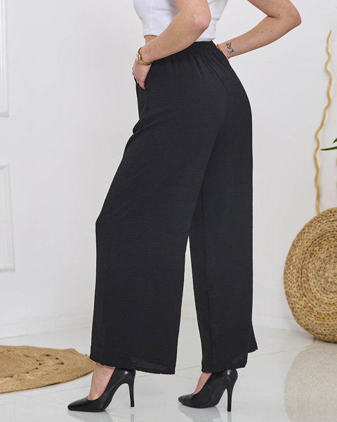 Жіночі широкі штани палаццо чорного кольору - Одяг